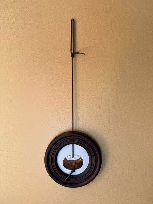 Champion Conker circular two-colour hand-printed lino art print framed with shoelace hanging