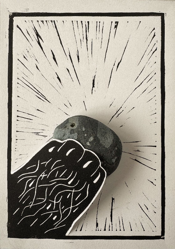Framed A5 hand-printed black lino print 'Otter Paw' with a real unique stone.