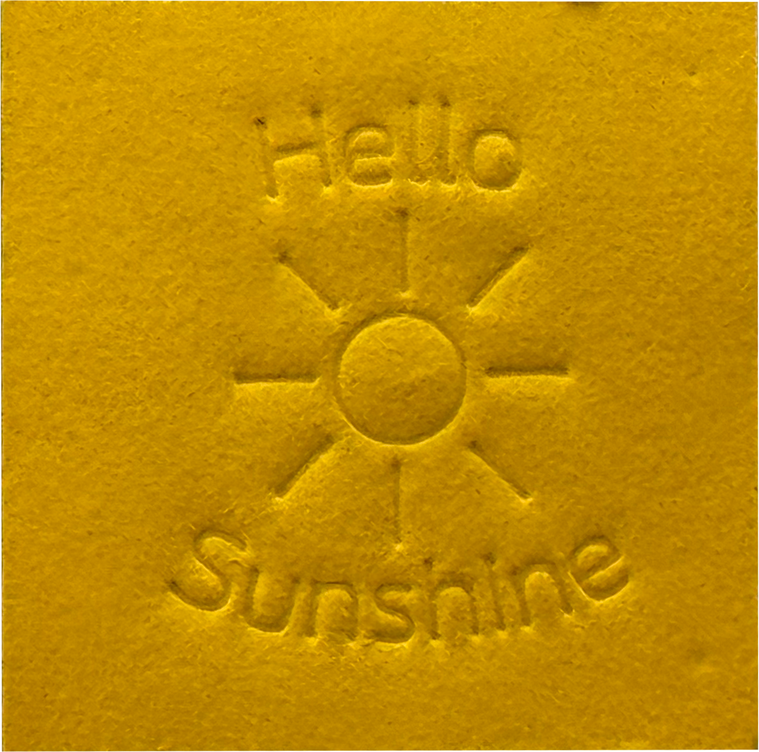 Surface Detail of original, minimalist, hand-embossed yellow art card featuring the positive message ‘Hello Sunshine’